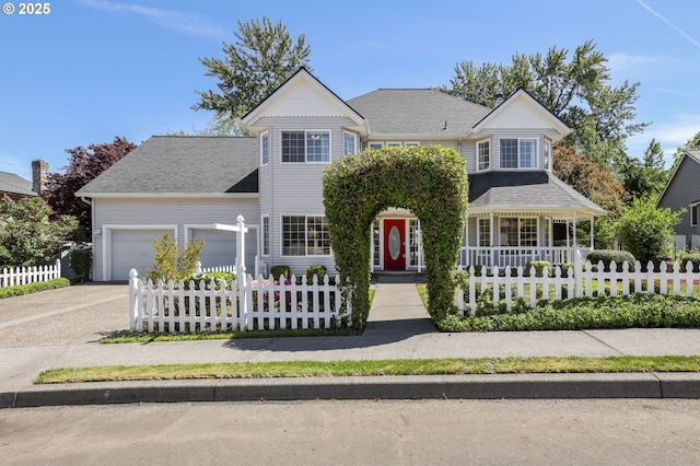 view of front facade featuring a garage, a fenced front yard, and covered porch