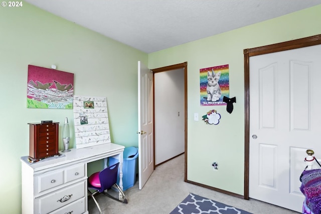 bedroom featuring light colored carpet