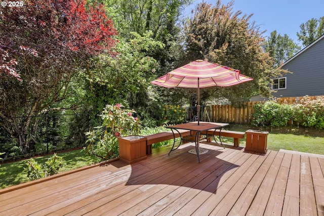 wooden deck featuring outdoor dining space