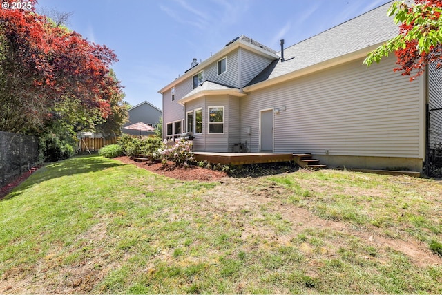 rear view of house with a deck