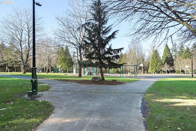 view of home's community with a lawn