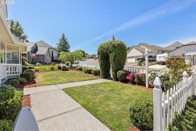 view of yard featuring a residential view