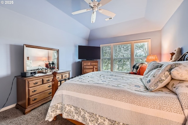 carpeted bedroom featuring vaulted ceiling, visible vents, ceiling fan, and baseboards