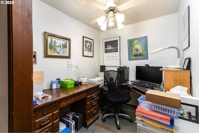 carpeted home office with ceiling fan