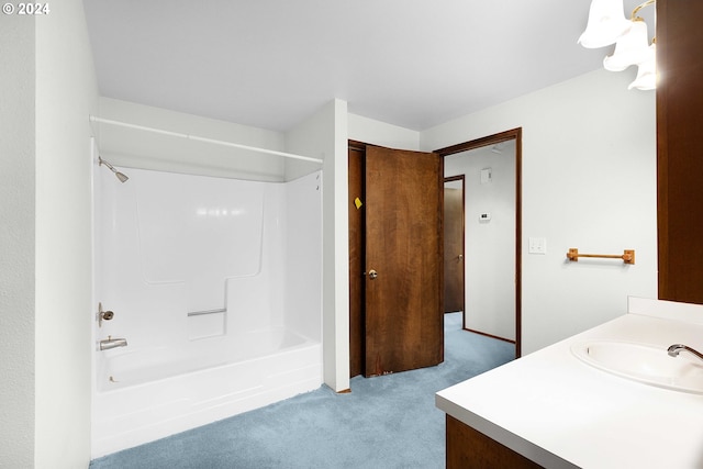 bathroom featuring vanity and shower / bath combination