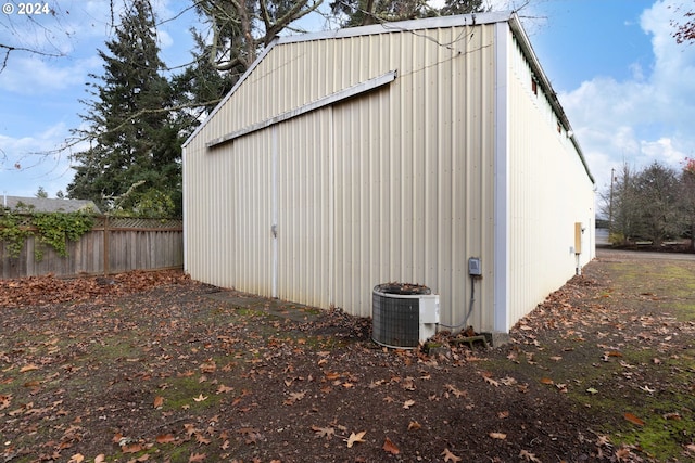 view of outbuilding featuring central air condition unit