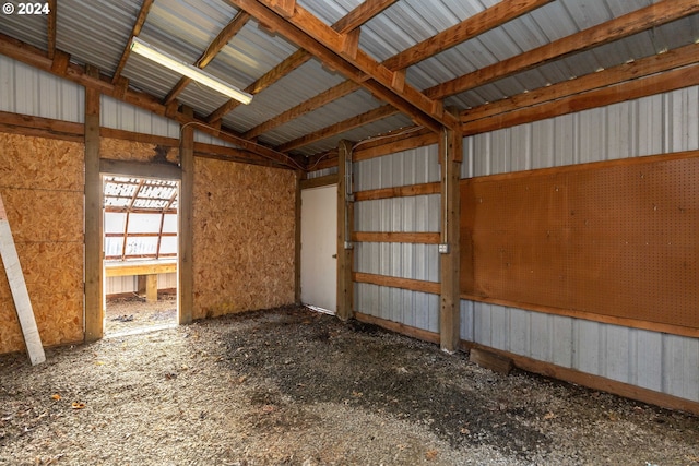 misc room with lofted ceiling