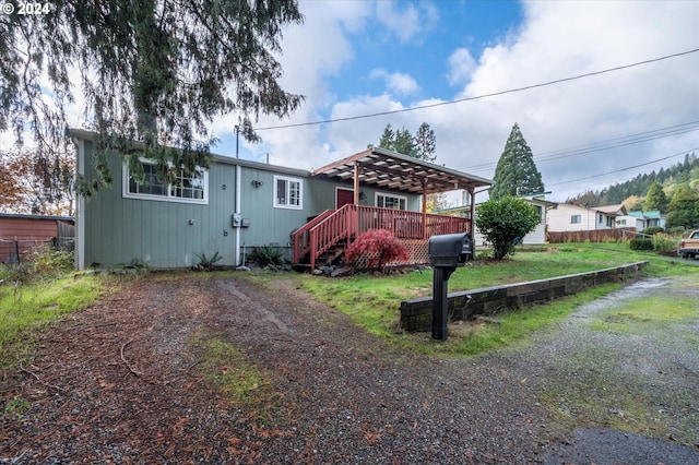 680 NE Laurance St, Myrtle Creek, OR 97457 - view of front of home featuring a wooden deck