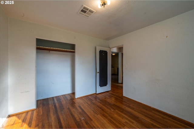680 NE Laurance St, Myrtle Creek, OR 97457 - unfurnished bedroom with hardwood / wood-style floors and a closet