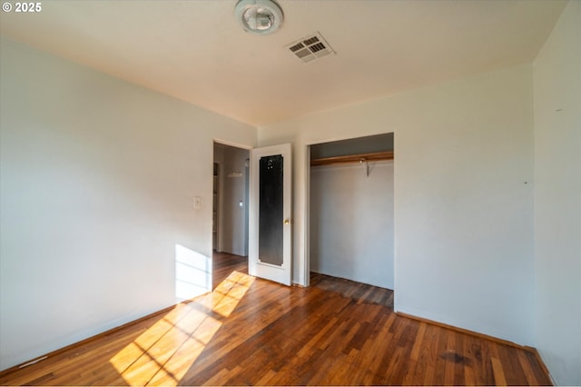 680 NE Laurance St, Myrtle Creek, OR 97457 - unfurnished bedroom featuring a closet and wood finished floors