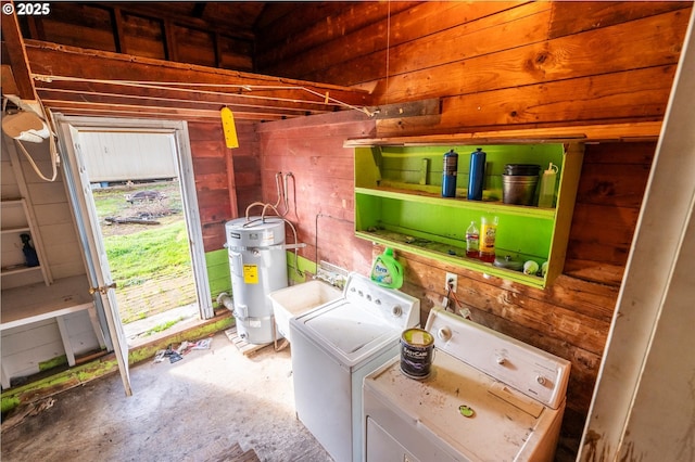 680 NE Laurance St, Myrtle Creek, OR 97457 - laundry room featuring washer and clothes dryer, wooden walls, and secured water heater
