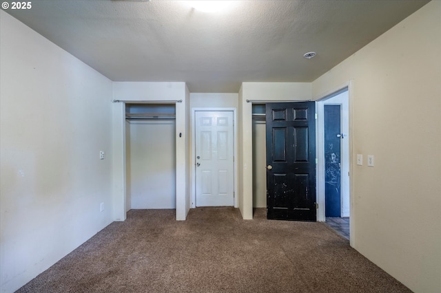 680 NE Laurance St, Myrtle Creek, OR 97457 - unfurnished bedroom with carpet flooring and multiple closets