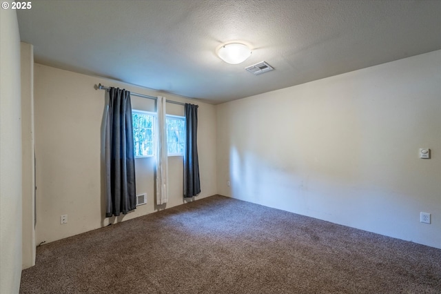 680 NE Laurance St, Myrtle Creek, OR 97457 - unfurnished room featuring carpet and a textured ceiling