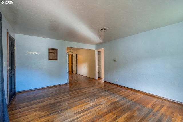 680 NE Laurance St, Myrtle Creek, OR 97457 - empty room featuring wood-type flooring and baseboards
