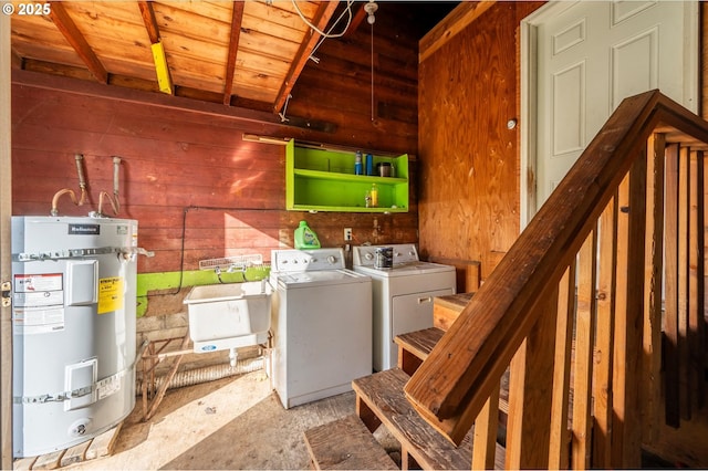 680 NE Laurance St, Myrtle Creek, OR 97457 - washroom with water heater, washer and dryer, wooden walls, and wooden ceiling