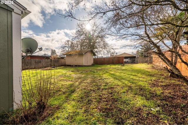 680 NE Laurance St, Myrtle Creek, OR 97457 - fenced backyard with a storage unit