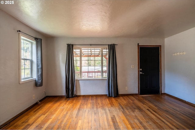 680 NE Laurance St, Myrtle Creek, OR 97457 - spare room with hardwood / wood-style floors and baseboards