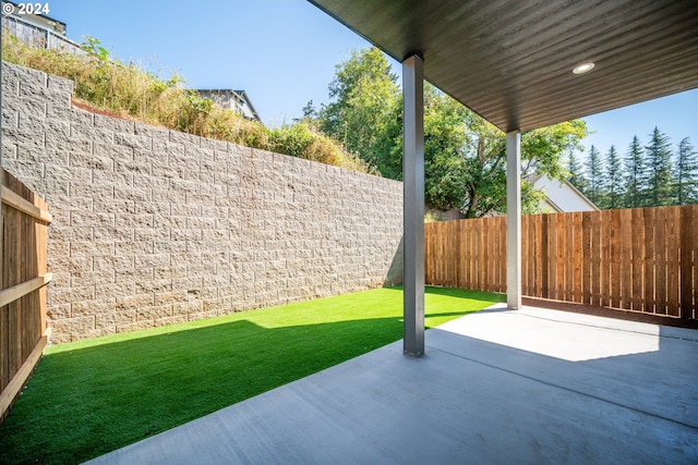 view of patio with a fenced backyard