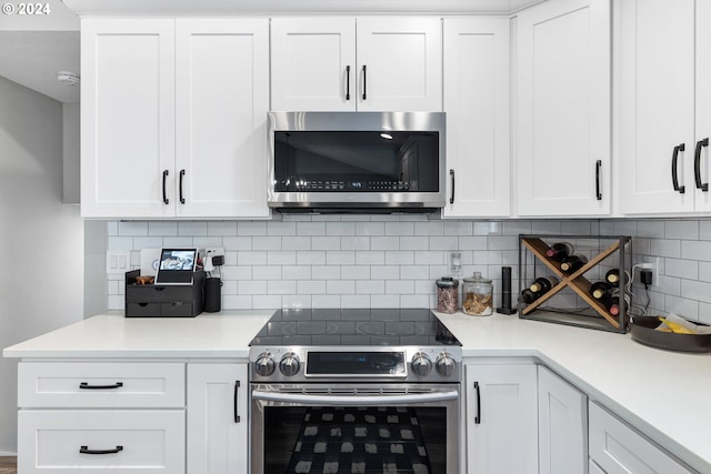 kitchen featuring white cabinetry and stainless steel appliances