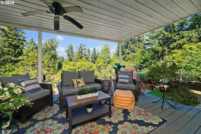 wooden terrace with an outdoor hangout area