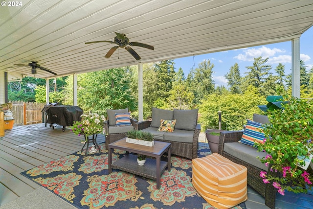 view of patio featuring an outdoor living space, a deck, grilling area, and ceiling fan