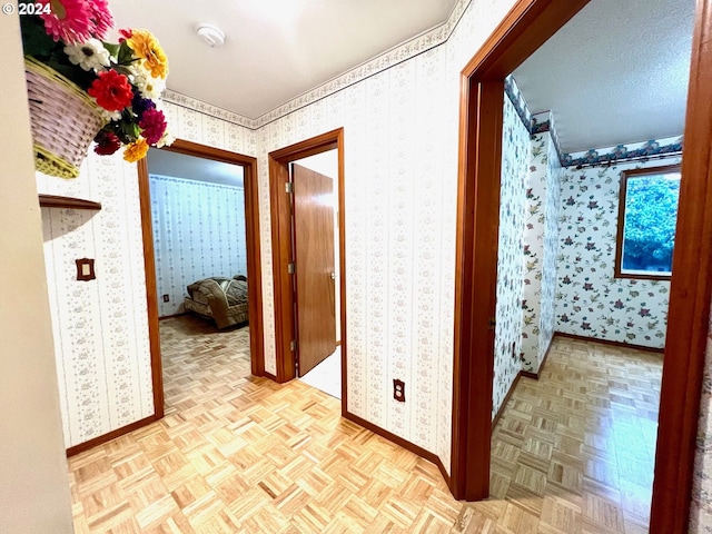 hallway with light parquet floors