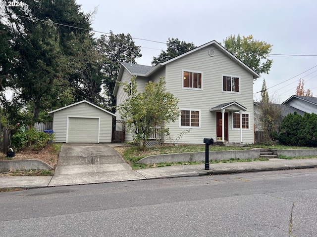 view of front of home with an outbuilding and a garage