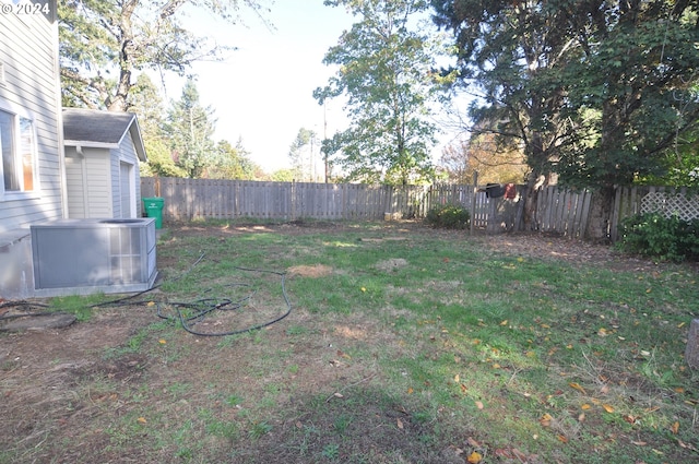 view of yard with central AC