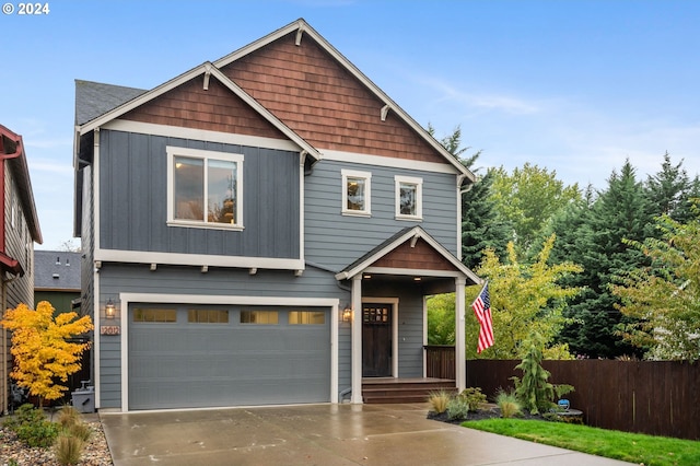 craftsman inspired home with a garage