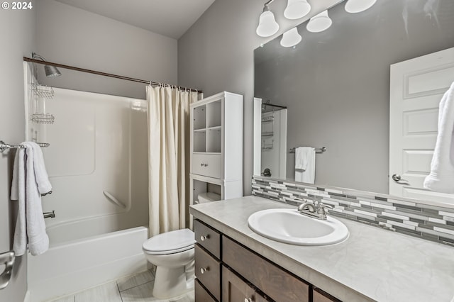 full bathroom with shower / bath combo, tile patterned flooring, backsplash, vanity, and toilet