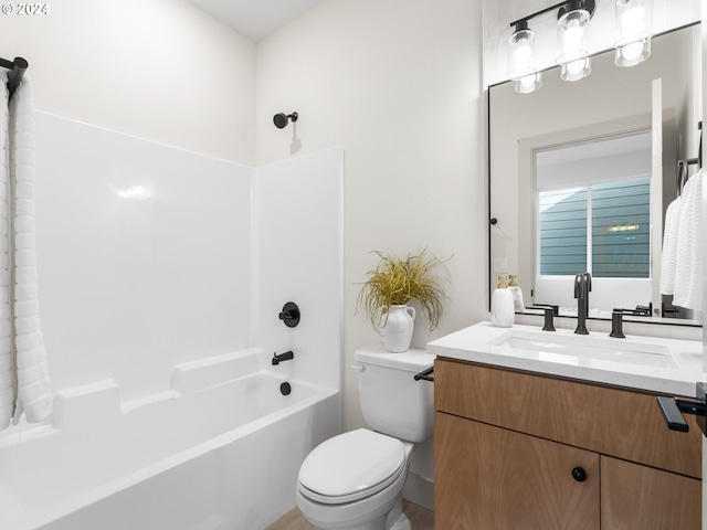 full bathroom with toilet, tub / shower combination, and vanity