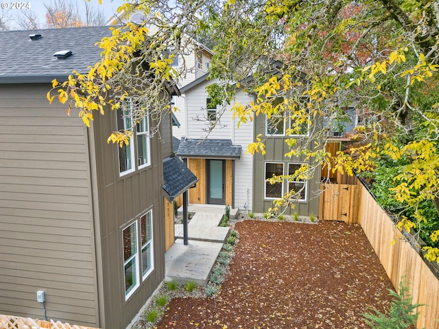 back of house with a patio