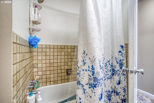 full bath featuring shower / bath combination with curtain