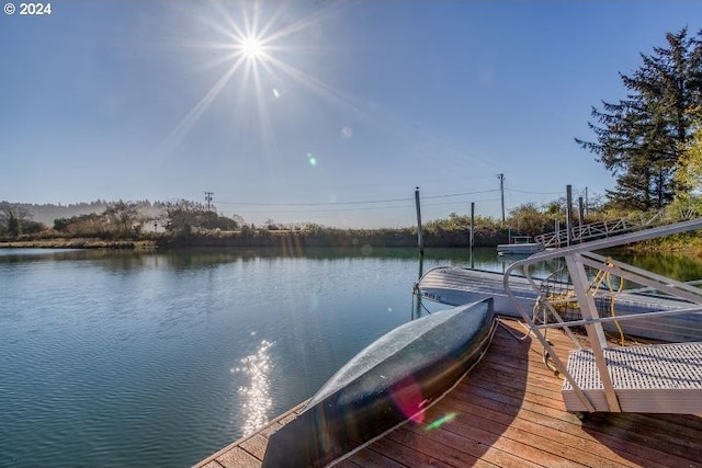 view of dock with a water view