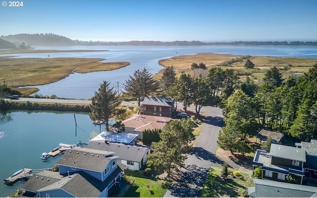 aerial view featuring a residential view and a water view