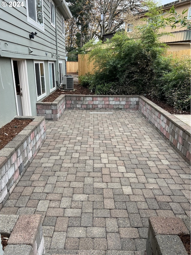 view of patio with cooling unit