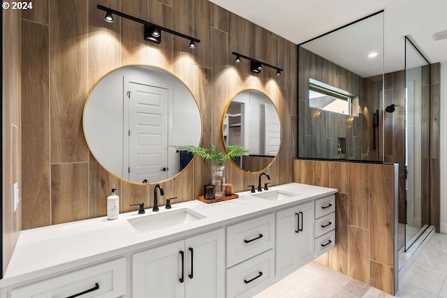 bathroom with vanity and an enclosed shower