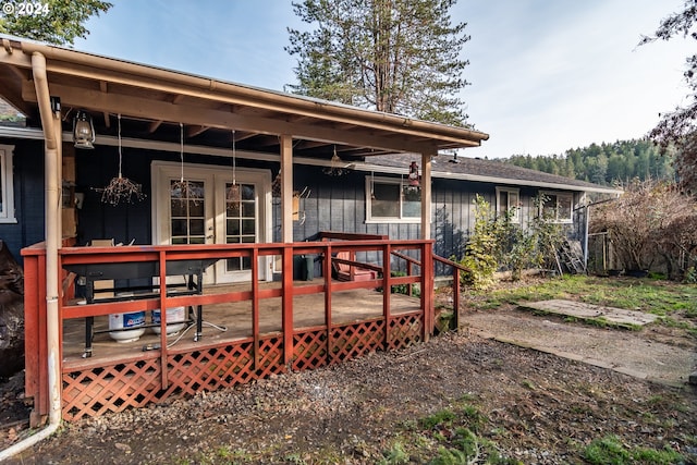 rear view of house with a deck