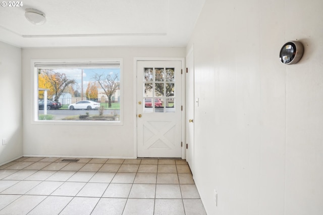 entryway featuring light tile patterned floors