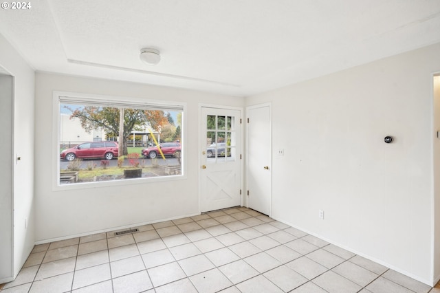 view of tiled empty room