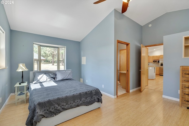 bedroom with baseboards, light wood finished floors, ceiling fan, and vaulted ceiling