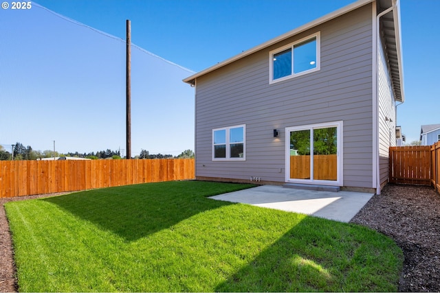 11122 NE 91st Ave, Vancouver, WA 98662 - back of property featuring a fenced backyard, a lawn, and a patio area