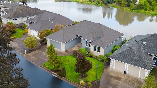 birds eye view of property featuring a water view