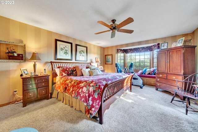 bedroom with light colored carpet and ceiling fan