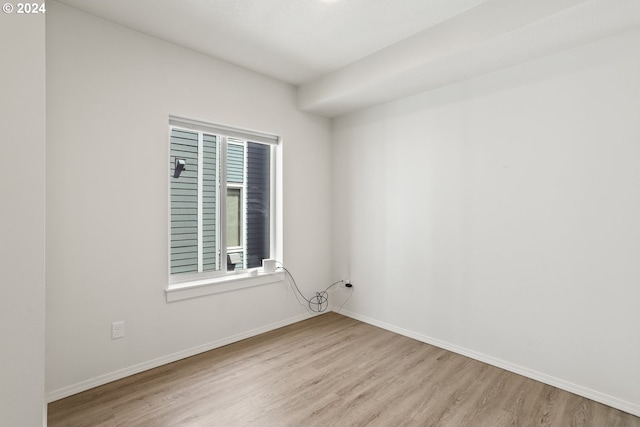 empty room featuring light hardwood / wood-style floors