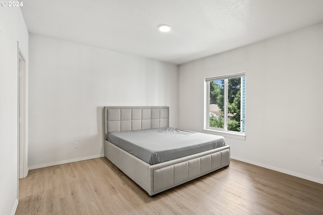 bedroom featuring light hardwood / wood-style floors