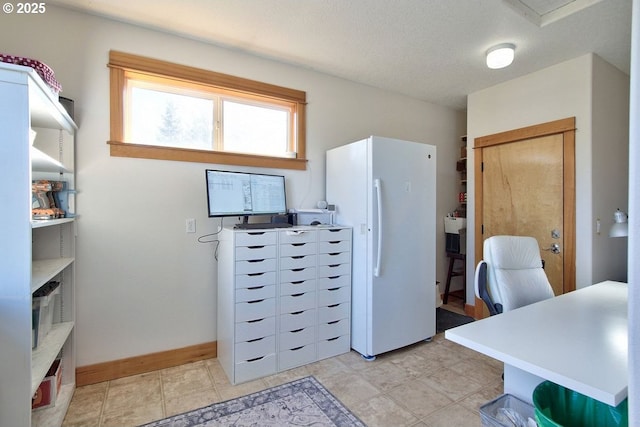 office space featuring a textured ceiling