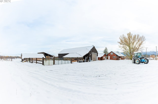 yard covered in snow with an outdoor structure