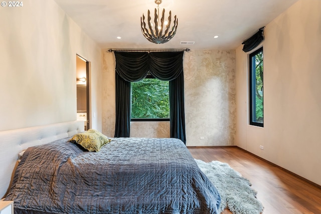 bedroom featuring wood-type flooring