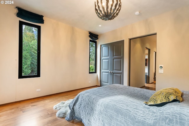 bedroom with light hardwood / wood-style flooring